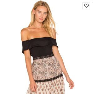 Revolve Black body suit NWT